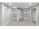 Finished basement space with built-in shelving at 11035 W Lakeshore Dr, Carmel, IN 46033