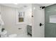 Bright bathroom featuring a walk-in shower and window at 11035 W Lakeshore Dr, Carmel, IN 46033
