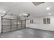 Spacious garage with an automatic door and plenty of room for vehicles and storage at 11035 W Lakeshore Dr, Carmel, IN 46033