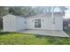 Spacious backyard featuring a patio, ample green space, and a well-maintained exterior at 1125 S Drexel Ave, Indianapolis, IN 46203