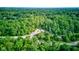Bird's eye view of property, with parking area surrounded by nature at 11510 Ralston Ave, Carmel, IN 46032