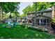 Spacious backyard with a shed, fire pit, hot tub, and screened-in porch, perfect for outdoor living and entertaining at 11510 Ralston Ave, Carmel, IN 46032