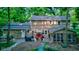 Stunning backyard featuring a deck, outdoor seating, a grill, hot tub, and a screened-in porch perfect for entertaining at 11510 Ralston Ave, Carmel, IN 46032