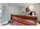 Warm bedroom featuring a sleigh bed, wall decor, and soft lighting for a comfortable ambiance at 11510 Ralston Ave, Carmel, IN 46032