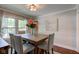 This dining room features an oversized window offering great light at 11510 Ralston Ave, Carmel, IN 46032