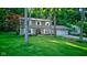 Two-story home with a well-maintained lawn, driveway, and verdant foliage at 11510 Ralston Ave, Carmel, IN 46032