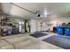 Spacious garage featuring concrete floors, overhead lighting, and ample storage racks at 11510 Ralston Ave, Carmel, IN 46032