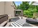 Inviting backyard patio features hot tub, a gazebo, and comfortable seating for outdoor enjoyment at 11987 Quarry Ct, Fishers, IN 46037