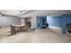 Spacious basement featuring a dining area, bar area with dark cabinetry, and plenty of open space at 11987 Quarry Ct, Fishers, IN 46037