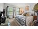 Cozy bedroom with ample natural light, a comfortable bed, and warm decor at 11987 Quarry Ct, Fishers, IN 46037