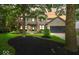 Charming two-story home with a brick and vinyl exterior, black mulch beds, and well-manicured lawn at 11987 Quarry Ct, Fishers, IN 46037