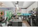 Bright eat-in kitchen featuring modern appliances, a center island, and patio access at 11987 Quarry Ct, Fishers, IN 46037