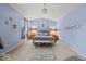 Spacious main bedroom with plush carpeting, a sitting area and vaulted ceiling at 11987 Quarry Ct, Fishers, IN 46037