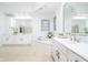 Bright bathroom with double vanity, soaking tub, and glass block window at 12192 Woods Bay Pl, Carmel, IN 46033