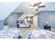 Spacious bedroom featuring multiple beds and a charming, cozy atmosphere at 12192 Woods Bay Pl, Carmel, IN 46033