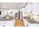 Modern kitchen featuring granite countertops and stainless steel appliances at 12192 Woods Bay Pl, Carmel, IN 46033