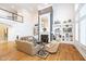 Spacious open living room with hardwood floors, two-story ceiling and lots of natural light at 12192 Woods Bay Pl, Carmel, IN 46033