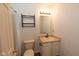 Standard bathroom with a single sink vanity, toilet, and shower-tub combo at 12671 Endurance Dr, Fishers, IN 46037
