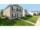 A cozy home exterior featuring a well-manicured lawn and charming curb appeal at 12671 Endurance Dr, Fishers, IN 46037