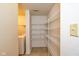 Convenient laundry area has a full-size washer and dryer, plus storage shelves at 12671 Endurance Dr, Fishers, IN 46037