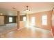 Spacious living area with tile floors and access to the backyard at 12671 Endurance Dr, Fishers, IN 46037