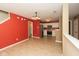 View of open living space leading into kitchen with stainless appliances at 12671 Endurance Dr, Fishers, IN 46037