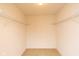 Walk-in closet with carpeted floors and hanging shelves at 12671 Endurance Dr, Fishers, IN 46037