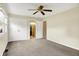 Large bedroom featuring neutral walls, carpeting, and a closet with double doors at 13172 E 116Th St, Fishers, IN 46037