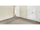A bright bedroom features neutral walls, carpeted flooring, and closet space, creating a serene and inviting space at 13172 E 116Th St, Fishers, IN 46037