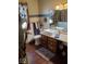 Stylish bathroom featuring a unique vanity, decorative accents, and natural textures at 1322 Greenway Dr, Anderson, IN 46011