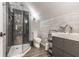 Well-lit bathroom featuring a glass enclosed shower and a modern sink with a gray vanity at 140 4Th Nw St, Carmel, IN 46032