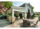 Charming home featuring a covered patio and a well-manicured backyard perfect for outdoor entertaining at 140 4Th Nw St, Carmel, IN 46032
