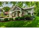 Charming craftsman-style home with well-manicured lawn and inviting front porch at 140 4Th Nw St, Carmel, IN 46032