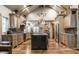 Spacious kitchen with granite countertops, stainless steel appliances and open floor plan at 140 4Th Nw St, Carmel, IN 46032