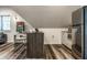 Stylish kitchenette with a small island, stainless steel appliances, and a game area at 140 4Th Nw St, Carmel, IN 46032
