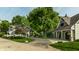 Charming street view showcases lush greenery, curb appeal, and well-maintained homes at 140 4Th Nw St, Carmel, IN 46032