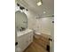 Beautifully remodeled bathroom features new fixtures, vanity, and updated shower/tub at 1421 S Meridian St, Indianapolis, IN 46225