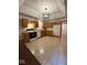 Open kitchen featuring ample cabinetry, tile floor, and modern appliances at 1421 S Meridian St, Indianapolis, IN 46225