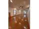 Bright, expansive living area with tray ceilings, hardwood floors, and updated windows at 1421 S Meridian St, Indianapolis, IN 46225