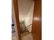 Interior stairwell features wooden stairs, providing access to the lower level at 1421 S Meridian St, Indianapolis, IN 46225