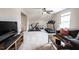 Spacious bonus room offers exercise equipment, entertainment center and comfortable seating at 14514 Glapthorn Rd, Fishers, IN 46037