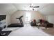 Versatile bonus room offers both exercise and relaxation areas with abundant space and light at 14514 Glapthorn Rd, Fishers, IN 46037