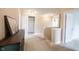 Upstairs hallway featuring neutral carpet and fresh paint, offering calm transitional space at 14514 Glapthorn Rd, Fishers, IN 46037