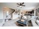 Inviting open-concept living area leads into the kitchen, showcasing stylish decor and comfortable seating at 14514 Glapthorn Rd, Fishers, IN 46037