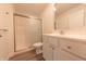 Clean, bright bathroom featuring a glass enclosed shower, modern vanity, and sleek mirror at 1452 Coen Ct, Columbus, IN 47201