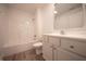 Clean bathroom featuring a shower/tub combo, a modern vanity, and a sleek mirror at 1452 Coen Ct, Columbus, IN 47201