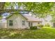 Backyard featuring well-maintained lawn, patio, and shade from a mature tree at 14911 Silver Thorne Way, Carmel, IN 46033