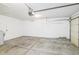Spacious garage with an automatic door and room for parking and storage at 14911 Silver Thorne Way, Carmel, IN 46033