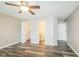 Spacious main bedroom features a ceiling fan, en-suite bathroom, and walk-in closet at 14911 Silver Thorne Way, Carmel, IN 46033