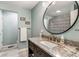 Bathroom featuring a stylish vanity with granite countertop and modern fixtures at 15812 Joliet Rd, Westfield, IN 46074
